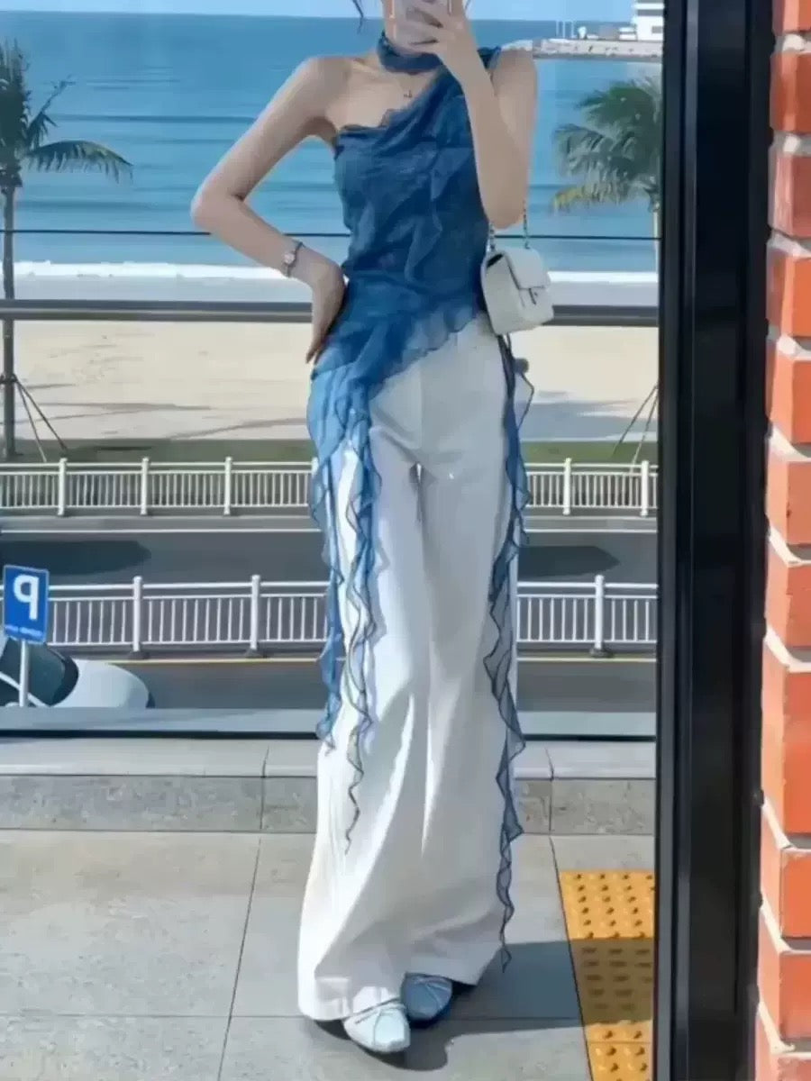 Blue one-shoulder ruffle top.