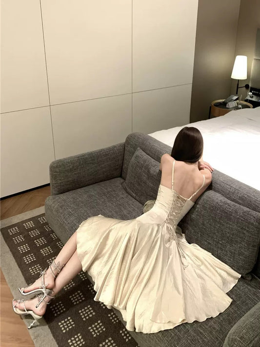 Champagne satin slip evening dress.