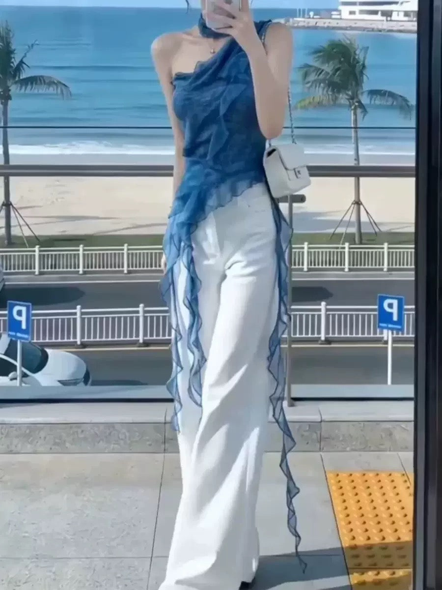 Blue one-shoulder ruffle top.