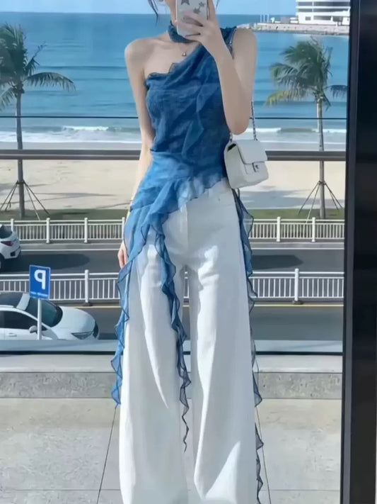 Blue one-shoulder ruffle top.