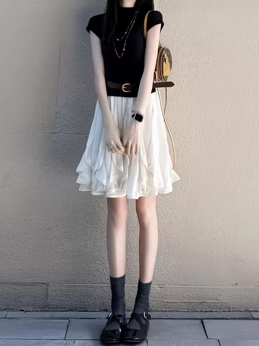 black mock neck top + irregular white tulle skirt