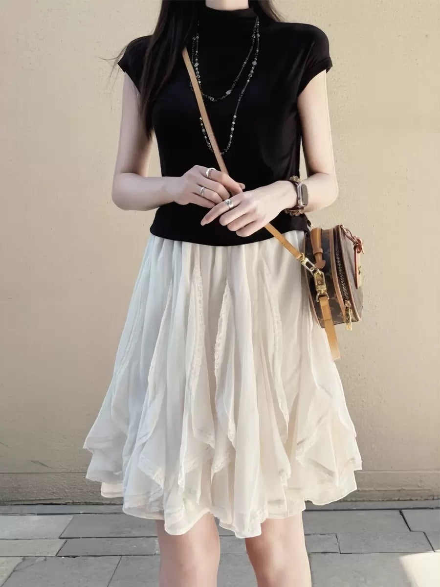 black mock neck top + irregular white tulle skirt